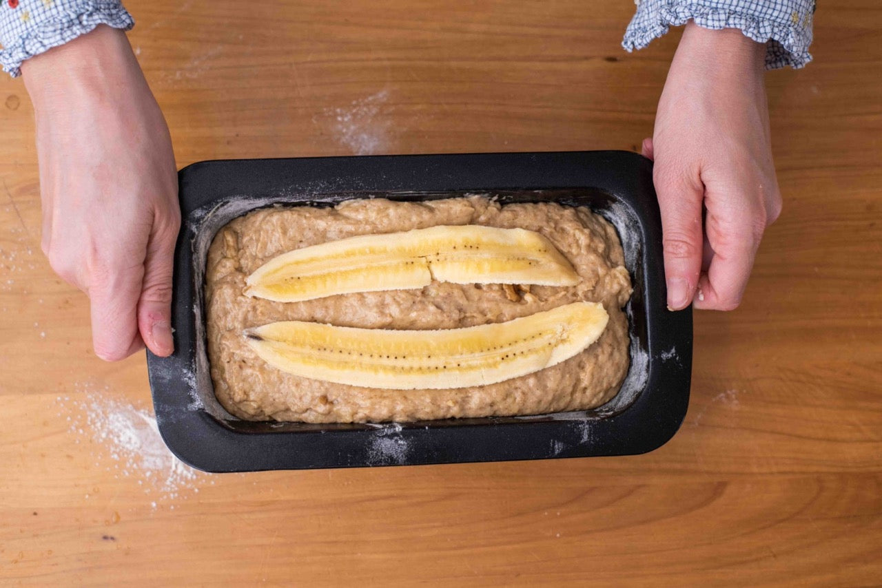 Protein banana bread batter ready in the loaf pan before baking