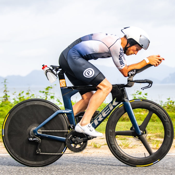 Brett Clifford NZ Triathlete Cycling in IronMan Race| Roam
