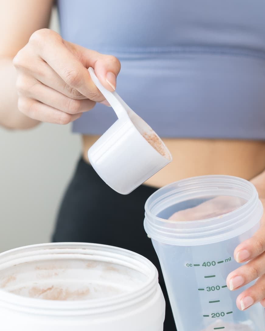 Woman Using Meal Replacement Powder Australia NZ