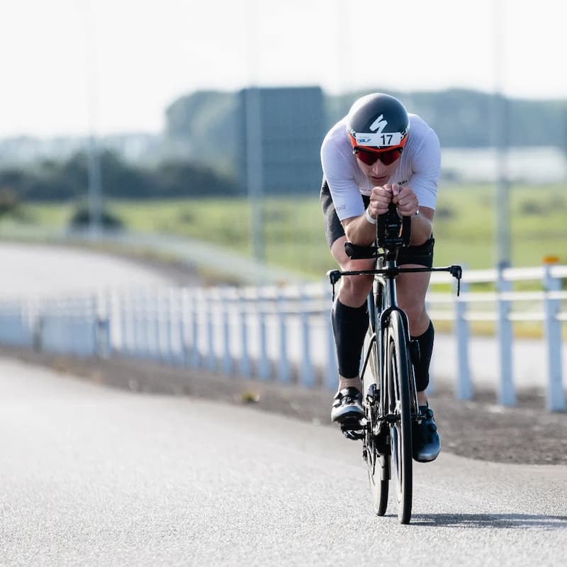 Triathlete Tom Somerville Cycling During Race